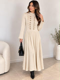 Robe longue plissée à brandebourgs